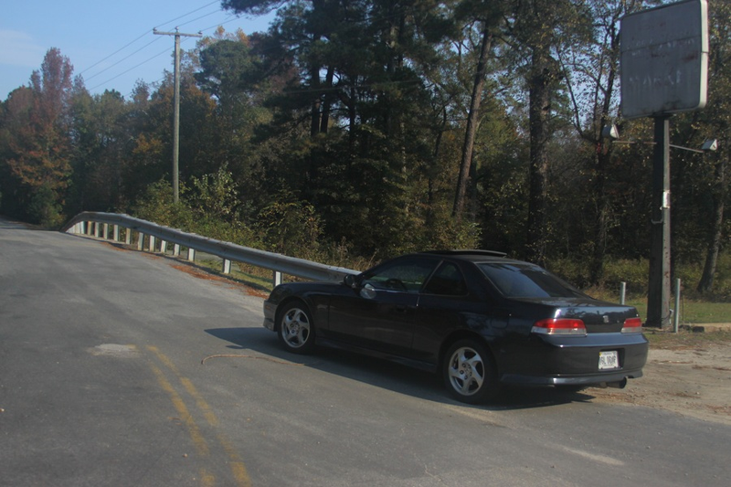The car in its natural habitat, a quiet back road in the middle of nowhere.